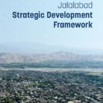 Cover page of the "Jalalabad Strategic Development Framework" document featuring an aerial view of Jalalabad city with a mountainous background.